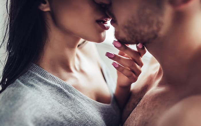 What Does it Mean When a Guy Touches Your Breast While Kissing?