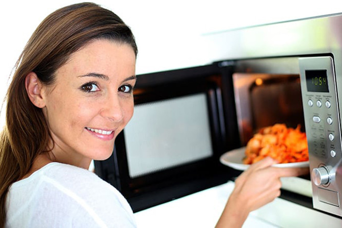 Why You Should Always Cover Food In The Microwave